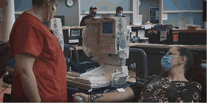 Gif of scene from Impact Life commercial of people giving blood